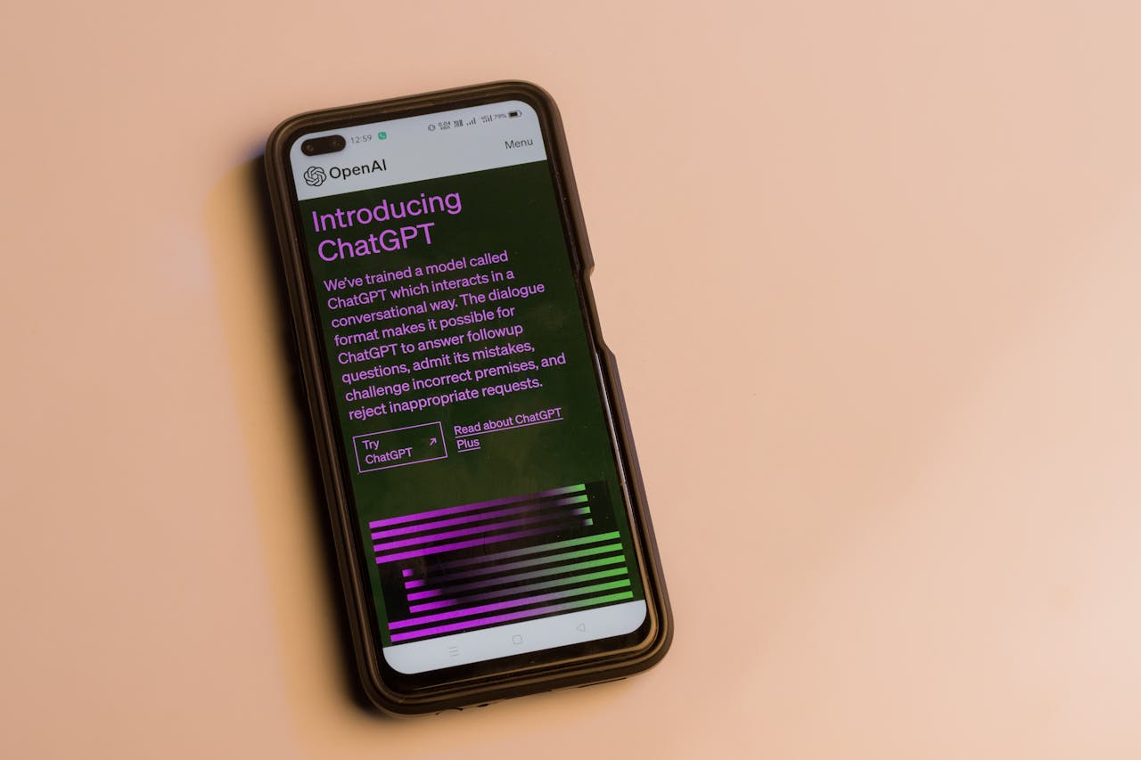 gallery-01 Smartphone screen showing ChatGPT introduction by OpenAI, showcasing AI technology.