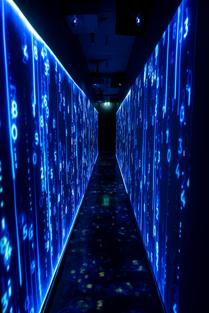 embark A luminous blue tunnel with digital numbers creating a futuristic, sci-fi ambiance.